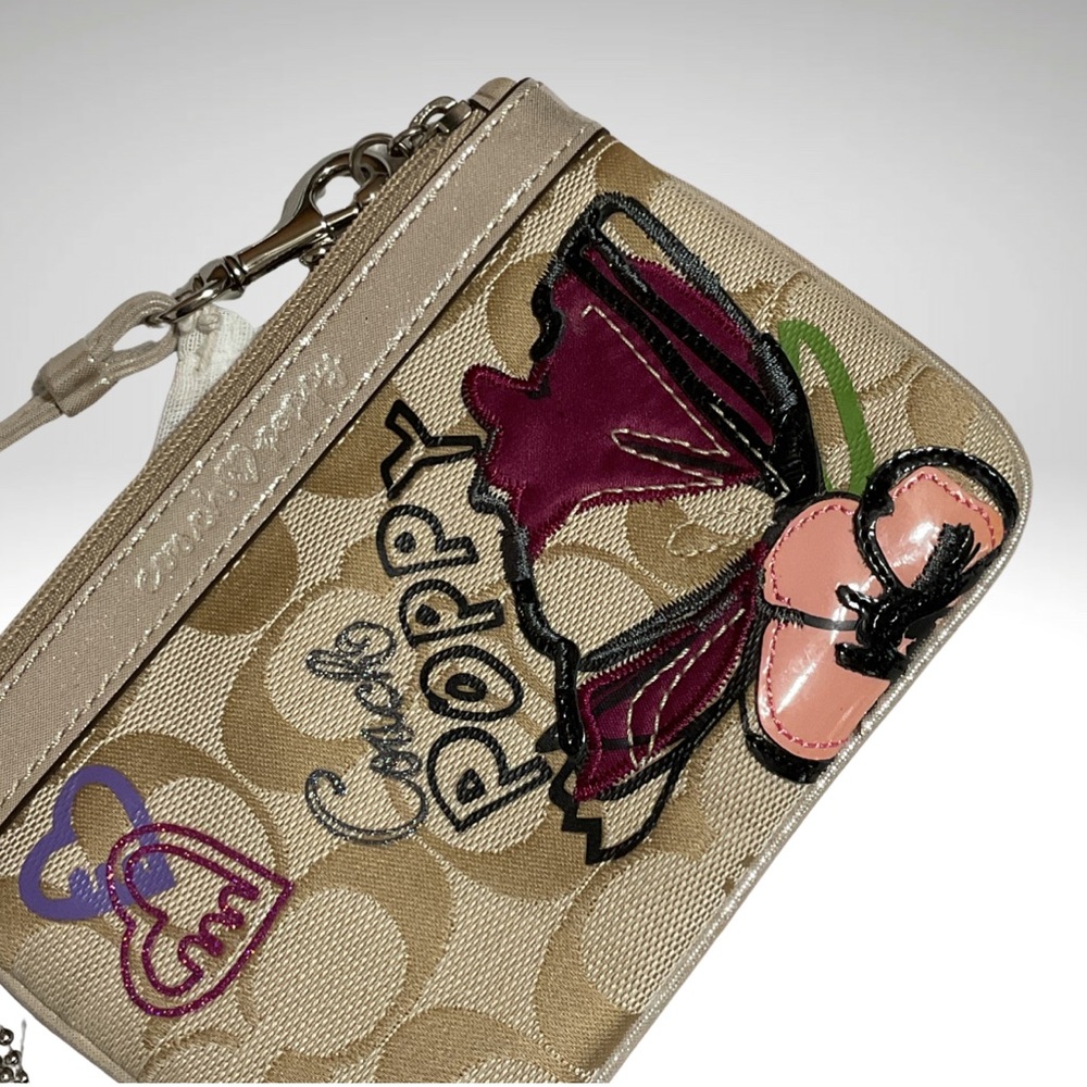 Coach Beige Signature Poppy Wristlet with Pink & Purple Floral Applique - Picture 4 of 10